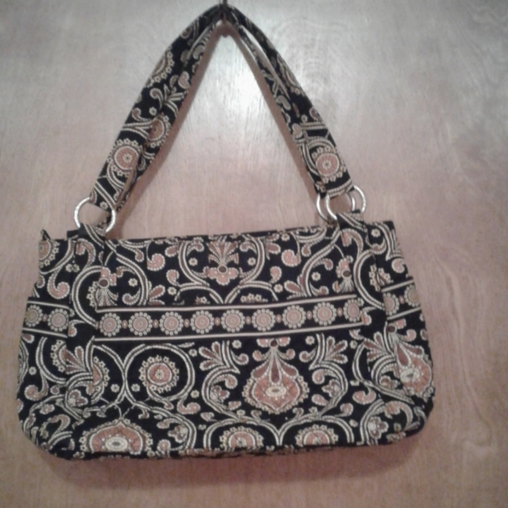 Vera Bradley purse.  Zippered pouch outside.